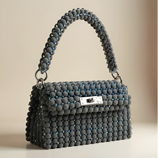 شنط خرز بتصاميم فريدة  
شنط يدوية فاخرة تيجان  