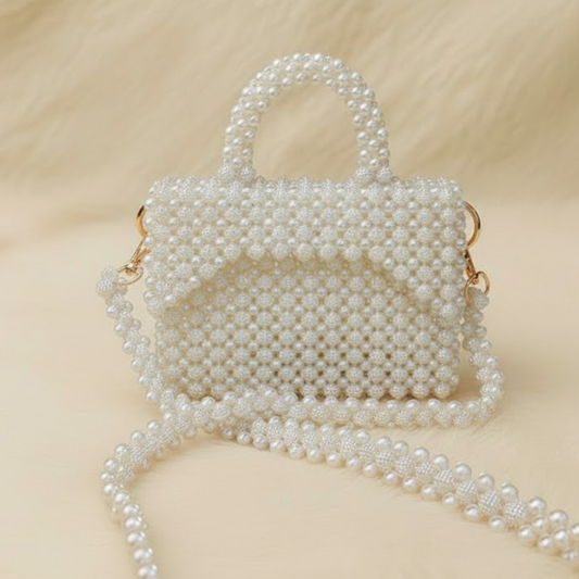 شنط خرز بتصاميم فريدة  
شنط يدوية فاخرة تيجان  