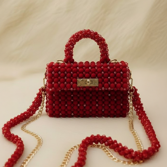 شنط خرز بتصاميم فريدة  
شنط يدوية فاخرة تيجان  